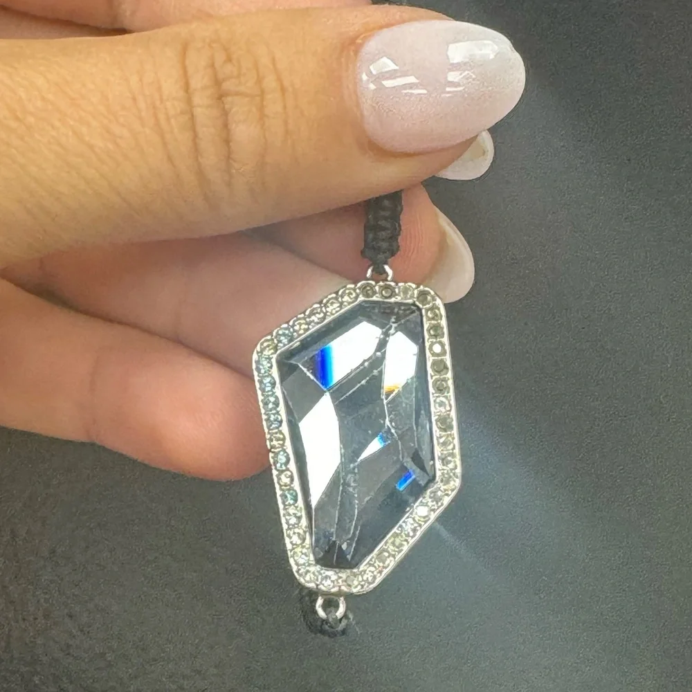 Swarovski silver tone on adjustable size cord bracelet